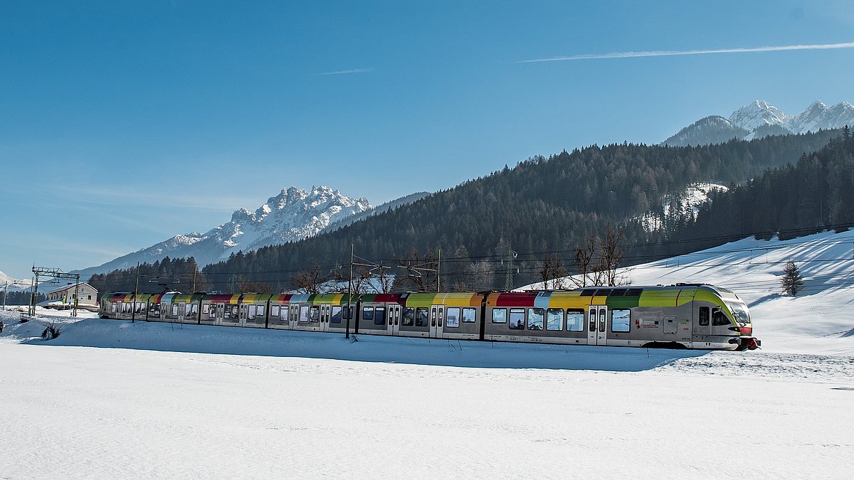 The Pustertal Railway in a snow-covered winter landscape